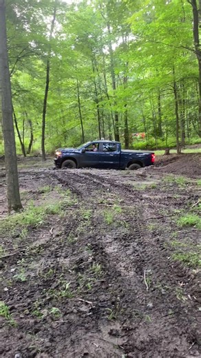 The new Chevy didn’t make it across the creek had to get the old squarebody to pull it out #mud #mudding #chevy #checytruck #stuck