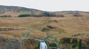 Drone Of Waterfall Down Between Two Cliffs