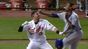 Manny Machado charged the mound and landed a right hand on Yordano Ventura after being hit in the back by a Ventura fastball. http://baseballfam.com/manny-machado-charges-mound-yordano-ventura/ | Baseball Fam