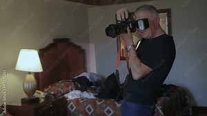 backstage of the photo-shoot with lingerie model in a hotel room