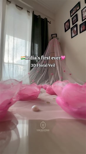 Anwesha Nath || Bridal Veil Designer on Instagram: "POV : You love wearable art !💗 A veil that took over 2000 hours — every second sewn with utmost attention to detail. Each petal, cut to shape and burnt at the edges to mimic the way real flowers curl in sunlight. We dyed every petal — layer by layer — until they felt alive. And stitched them onto sheer tulle, each with its own pearls, like a garden blooming just for you. This isn’t just a veil. It’s a memory you wear. A future heirloom. A love