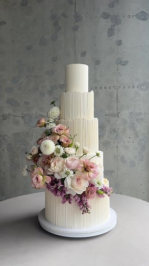 Exquisite 5-Tier Buttercream Wedding Cake with Delicate Rib Texture