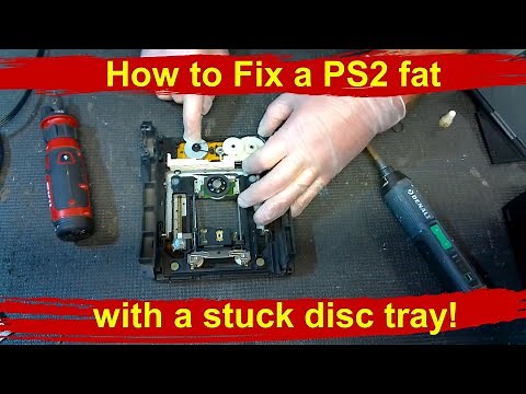 How to fix a PS2 fat disc tray that won't open PlayStation 2 stuck DVD CD disk drive repair tutorial