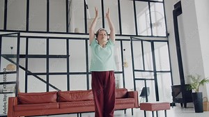 Old woman make yoga exercise at home. Mature woman have meditation