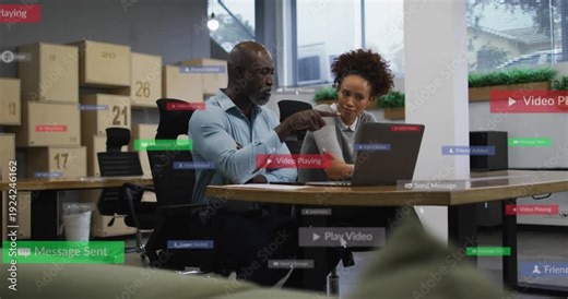 Man pointing at laptop starting play icons and alerts layering, woman engaging, reviewing business