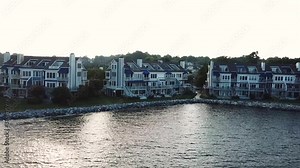 Dramatic Aerial View on Upscale Coastal Condo Buildings in Chesapeake Bay, Maryland USA in Twilight