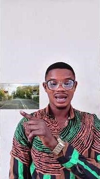 What is the first sign of an approaching train at a level crossing?