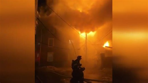 Firefighters battle blaze that burned church, multi-family home in Lynn