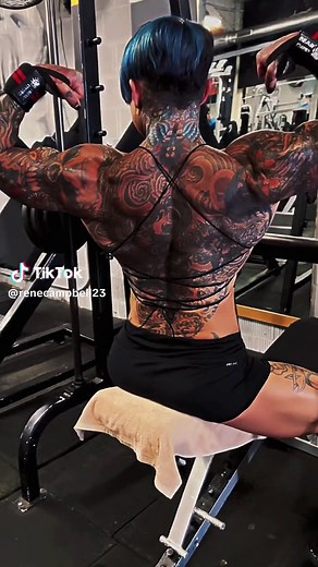 Inked Female Tattoo Artist Creates Happiness with Unique Designs