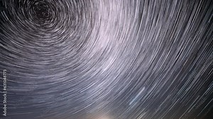 Stars Rotate Of Sky Background. 4k Time Lapse Night Starry Sky Stars And Meteoric Track Trails. Spin Trails Of Stars. Large Exposure. Spin Of Stars Time Lapse, Timelapse, Time-lapse.