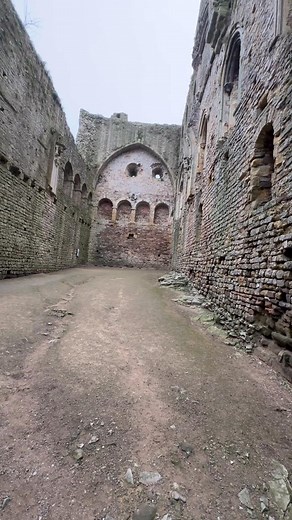 Chepstow Castle, perched on a cliff overlooking the River Wye in Wales. Chepstow Castle is one of the oldest surviving stone castles in Britain. Built in the late 11th century by the Normans, it was a strategic stronghold due to its commanding position. The castle's extensive fortifications, including its impressive gatehouse and towers, reflect its military importance during the medieval period. Its well-preserved ruins offer a glimpse into medieval defensive architecture and the turbulent hist