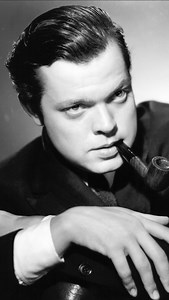 Considered one of the most influential storytellers in cinema, Orson Welles’ career took off in the 1930s with his radio broadcast of “The War of the Worlds,” which famously caused a nationwide panic because of its realistic presentation and timing. The broadcast, aired on Halloween night by the Mercury Theatre on the Air, was formatted as a series of news bulletins reporting a Martian invasion of Earth. It interrupted the regular programming in a way that mimicked actual news updates, which mad