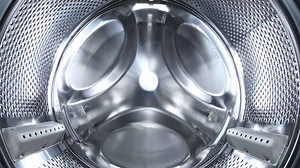 Empty plastic bottle in the washing machine - genius hack or waste of time?