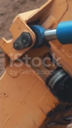 Caucasian Man in His Thirties Uses a Trencher to Cut a