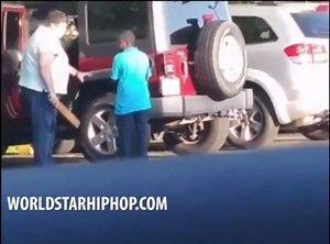 Child Abuse? Woman Beats Her Alleged Adopted Son With A Paddle In A Parking Lot!