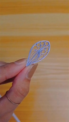 Master the husking technique and take your quilled flowers to the next level! Pin, wrap, and watch your petals bloom. #DIYPaperFlowers #HandmadeArt #QuillingArt #CreativeCrafts #PaperCrafts | Quilling Art by Glaiza