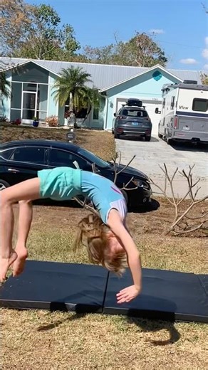 Round off backhand spring on the grass!#Gymnastics #BackHandspring #Flipping #Short #ForYou #Cheer
