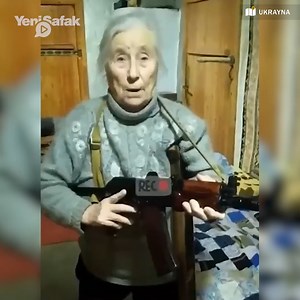 3.4K views · 38 reactions | Ukrainian granny picks up Kalashnikov, challenges Russian invaders Footage shows a brave Ukrainian granny who decided to pick up arms to defend her homeland, sending a message of defiance to Russian invaders. https://www.yenisafak.com/en/video-gallery/news/ukrainian-granny-picks-up-kalashnikov-challenges-russian-invaders-3591446 | Yeni Şafak | Facebook