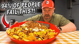 I traveled two hours west from Nashville to Lexington, Tennessee so I could attempt the "Smoke House" 6lb BBQ Loaded Nachos Challenge at Traveler's BBQ which had only been beaten by my friend Brandon Da Garbage Disposal Clark!! Sixteen other people had tried and failed. I had 30 minutes to feast on a 1/2 bag of nacho chips loaded with 1 lb juicy pulled pork, 1/2 lb smoked beef brisket, their homemade baked beans, nacho cheese, barbecue sauce, jalapenos, coleslaw, and more!! The challenge include