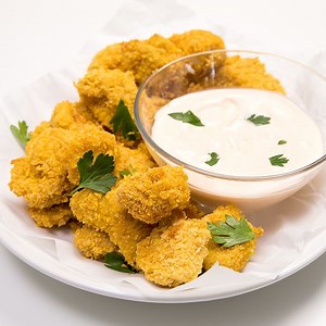 1.5K views · 26 reactions | Gluten Free Popcorn Chicken is nothing more than bite-sized pieces of breaded white meat chicken made extra tender with a secret, simple step, and baked to crispy perfection. Don't forget the spicy sriracha mayo! Printable Recipe: https://glutenfreeonashoestring.com/popcorn-chicken/ | Gluten Free on a Shoestring | Facebook