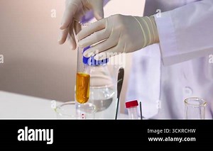 Scientist conducts a bromothymol blue experiment Stock Video Footage - Alamy