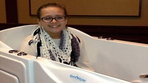 Check out this amazing Safe Step story! In 2014, Anna Grace McDonald was chosen as an honoree in the Safe Step Cares program, our initiative to benefit families and individuals in need of a walk-in tub. Seven years later, she is now living her dream. If someone you know could benefit from a new walk-in tub, visit www.safestepcares.com to learn more about the Safe Step Cares program and to make a nomination today! | Safe Step Walk-In Tubs & Showers