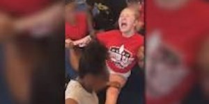 Videos show high school cheerleaders forced to do painful splits