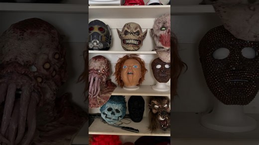 Showing off my spooky Halloween mask collection