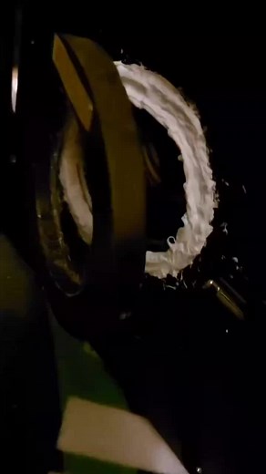 Washing Machine Close-Up: Foam and Spin Action