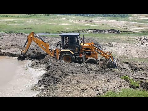 JCB Backhoe Working in Muddy Area | Heavy Equipment Struggle in Real Field Conditions