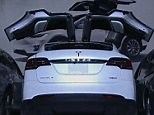 Tesla unveil radical Model X crossover with 'falcon wing doors' | Daily Mail Online