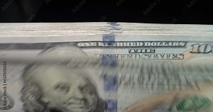 Banknote counter, money counting equipment. Cash counting equipment for paper money calculation. Counting machine counts money quickly accurately. Concept of financial power and economic development.