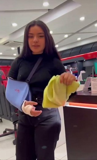 Broken arm cast in a sling