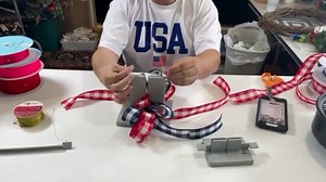 Video DIY – How to make the perfect patriotic bow… If you’re looking to create beautiful bows for your crafting projects, you’ve come to the right place! In this tutorial, we’re making the perfect patriotic bow. Grab your favorite ribbon and supplies, and let’s get crafting! Join Nick of Nick’s Seasonal Décor as he guides you step by step to make this lovely bow that will elevate your wreaths and festive décor. Let’s dive in and unleash your creativity! You can find this complete tutorial on our