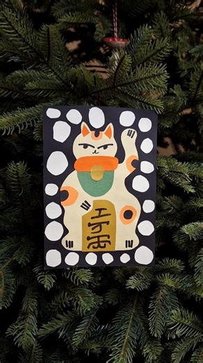 Enikő Katalin Eged on Instagram: "come slow down with me and make some maneki neko papercuts 🐈‍⬛🧡🥰 i've really needed something manual and grounding lately if you want to try it too, here are a few tips: ♥️💚🧡pick 3–4 colors in advance ✂️play with negative space, the cutout shape can be just as beautiful ❤️‍🩹 never throw away leftovers! Here i’m using tiny dots from a summer papercut piece and they make perfect snowflakes ❄️ I turn these into 🎄 christmas ornaments, and i absolutely love ho