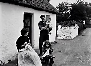 This Video depicts a traditional Irish cottage, characterized by its distinctive thatched roof and whitewashed wall 1900 | Irelands past in Motion