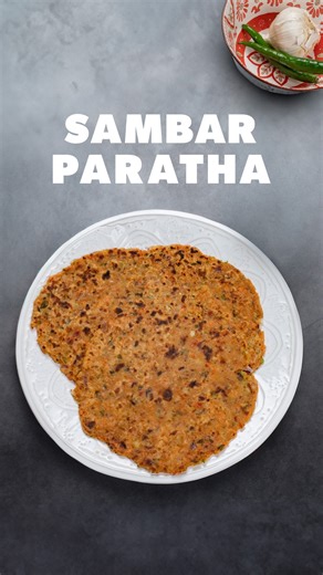 Sambar Paratha 🥬✨ A South Indian twist on the classic paratha: soft, veggie-loaded, and seasoned with fragrant sambhar masala. Perfect for breakfast, lunch, dinner… or anytime you want a cozy homemade meal. INGREDIENTS: 2 cups SWAD Wheat Flour (Chakki Atta) 1 medium carrot 1 small bell pepper 2 cabbage leaves 1 small tomato 1 small onion Handful of cilantro 2 medium boiled potatoes 3 garlic cloves 2 Tbsp sambhar masala 1½ tsp salt SWAD Ghee or oil (for frying) INSTRUCTIONS: 1️⃣ In a chopper, ad