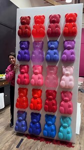 Finally standing it up for the first time 😍🍬 This gummy bear wall is almost ready for the lobby and I’m OBSESSED. What color are your eyes going to first? 👀👇 | Nikki Lynn Photography