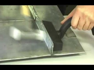 How to Seam a Metal Roof Panel with a Welt Iron