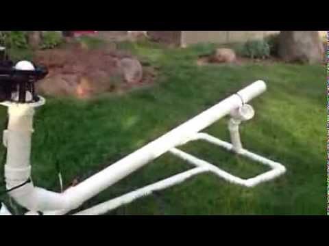 Leaf blower pitching machine