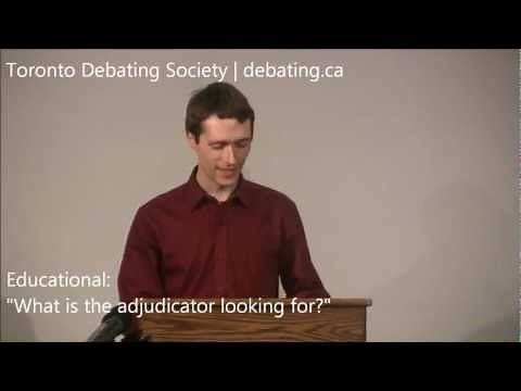 What does the adjudicator look for in a debate?