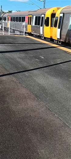 Queensland Rail's IMU 104/108 working on run TY39 ¤BRRP¤ departs from Petrie station on Sat 7 Feb