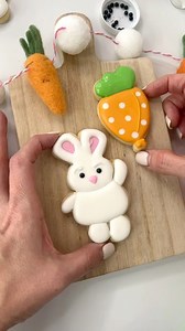 3.7K views · 20 reactions | Let’s talk about jazzing up your cookies! I used @thesugarart rainbow dust to the bunny ears to make them sparkle! I used my favorite wet-on-wet technique to the carrot balloon to add some pop! Use twine and attach to the bottom of the balloon leading to the hand for a fun finishing detail to your cookie set! Cutters from @thesprinklefactory | Summer's Sweet Shoppe | Facebook