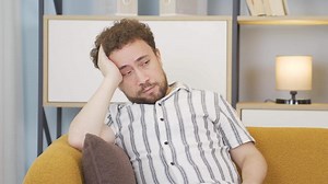 Falling asleep on the couch.