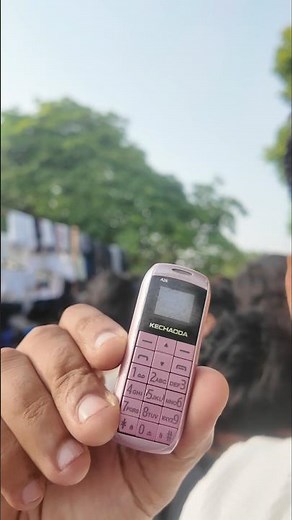 The Tiniest Phone Ever ? Comment Below