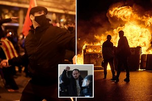 Spain riots leave 30 injured after arrest of rapper who mocked 'mafia' King