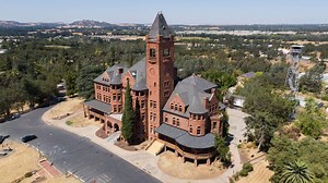Once-abandoned castle looms over a small California town. Its story is spooky and redeeming