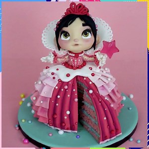 1.2M views · 1.6K shares | Wreck it Ralph 2 cake Vanellope Doll cake By: Zoe's fancy cakes | MetDaan Cakes | Facebook