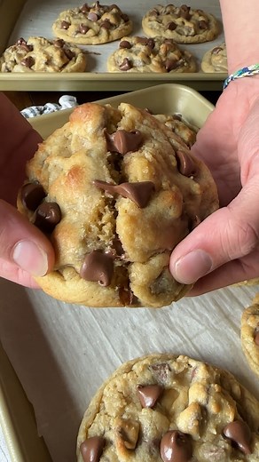 I created a pretty perfect copycat for Crumbl Chocolate Chip Cookies! Soft, thick, and loaded with milk chocolate chips! https://cookiesandcups.com/crumbl-cookie-recipe-copycat-chocolate-chip-cookie/ | cookies and cups
