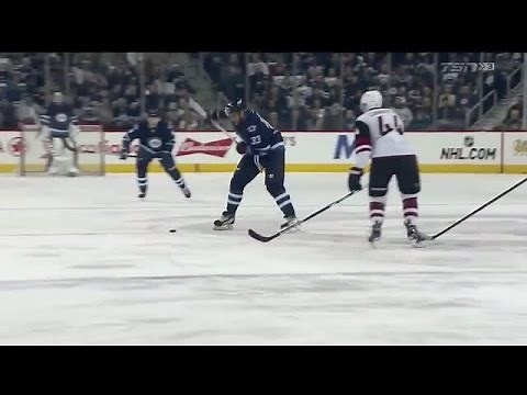 Byfuglien fools Domingue with center ice goal